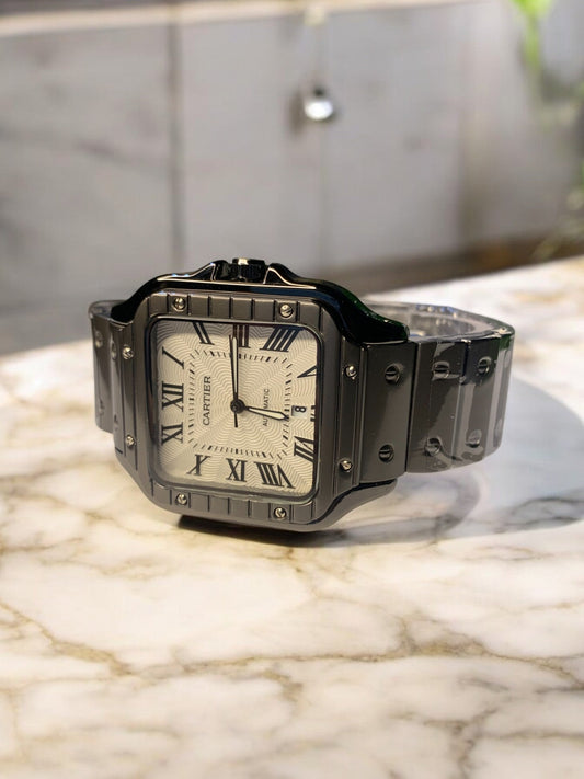 Cartier luxury watch with a square black stainless steel case, white textured dial, and bold Roman numeral markers. Features a sophisticated black bracelet and classic elegance, perfect for those with refined taste