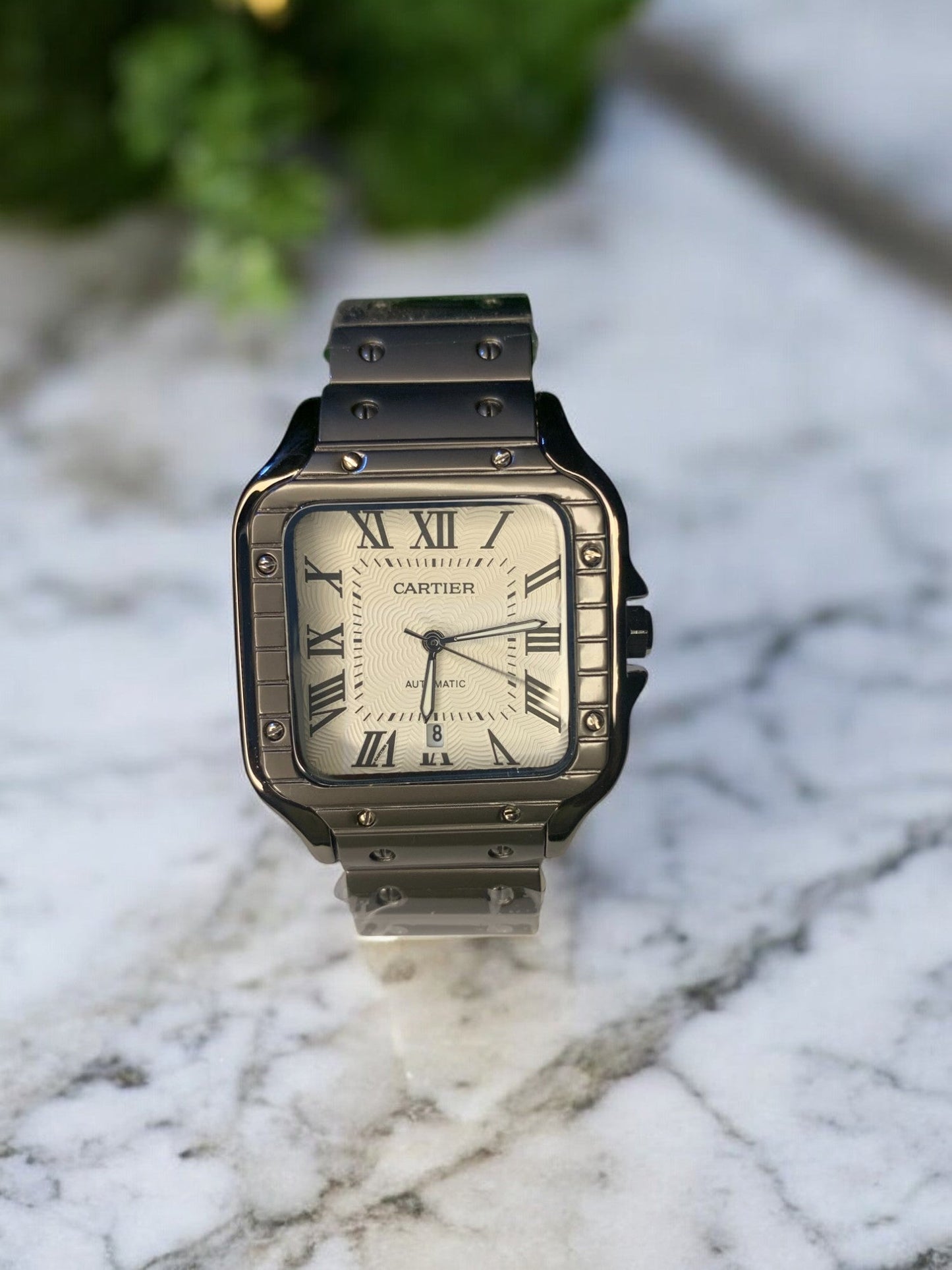 Cartier luxury watch with a square black stainless steel case, white textured dial, and bold Roman numeral markers. Features a sophisticated black bracelet and classic elegance, perfect for those with refined taste